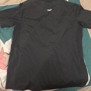 Stretchy athletic grey workout shirt sleeve top